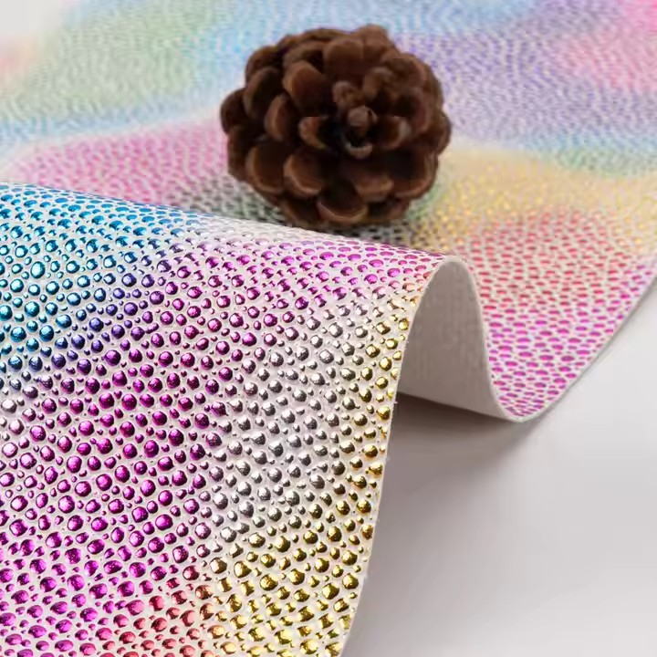 彩虹闪亮蝴蝶结彩色纹理压花1.0毫米PVC合成革产品用于沙发包带面料