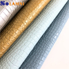 Pelle sintetica in PVC con motivo coccodrillo lucido