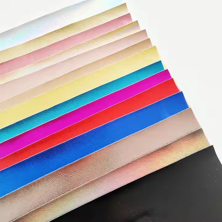 Pertsonalizatutako PU larru sintetikoa Iridiszentzia islatzailea Nappa larru koloretsua ehuna Ostadarraren efektu islatzailea Oinetako eta poltsetarako